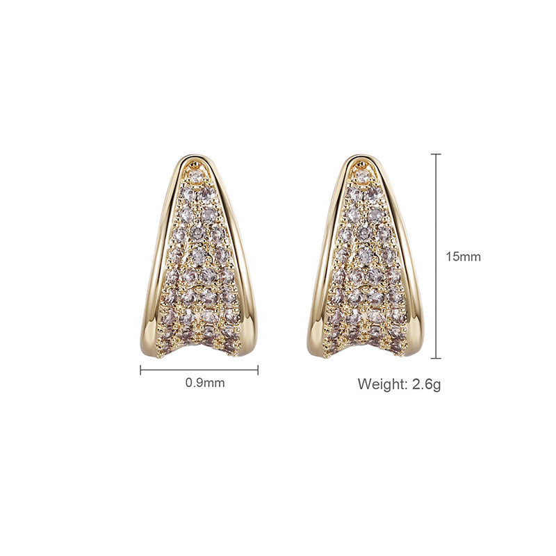 Gold earrings with gemstones and measurements on a white background
