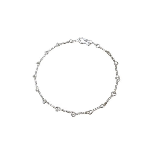 Silver bracelet on a white background