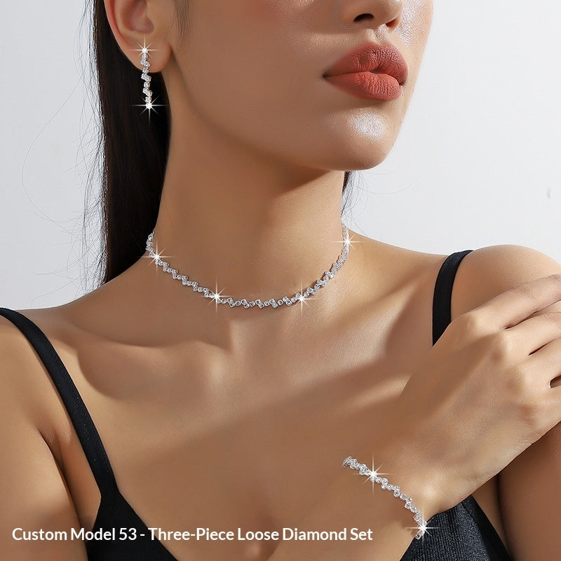 Woman wearing a diamond necklace and earrings on a plain background