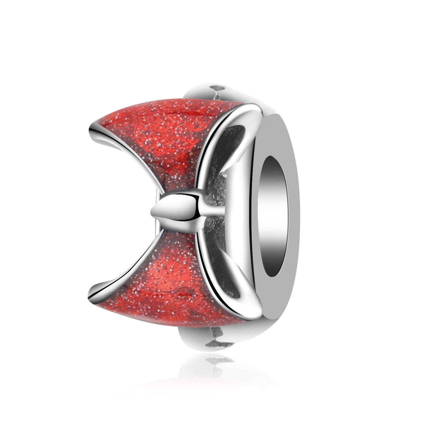 Jewelry charm with red glittery surface and silver accents on a white background