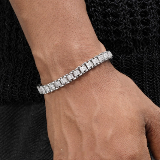 Diamond bracelet on a wrist against a black textured background