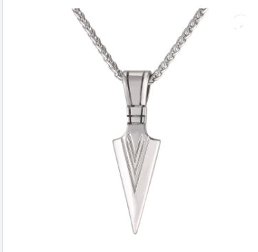 Silver arrowhead pendant on a chain against a white background