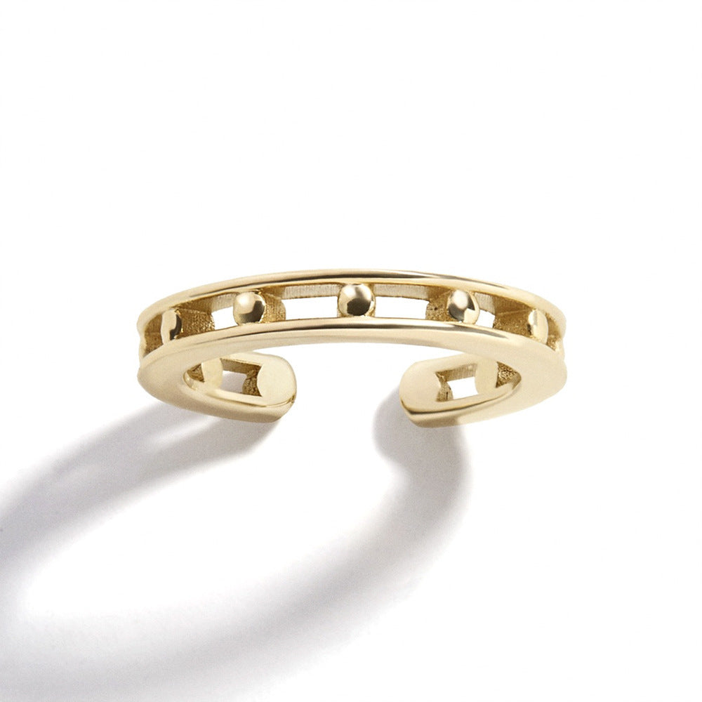 Gold bracelet on a white background