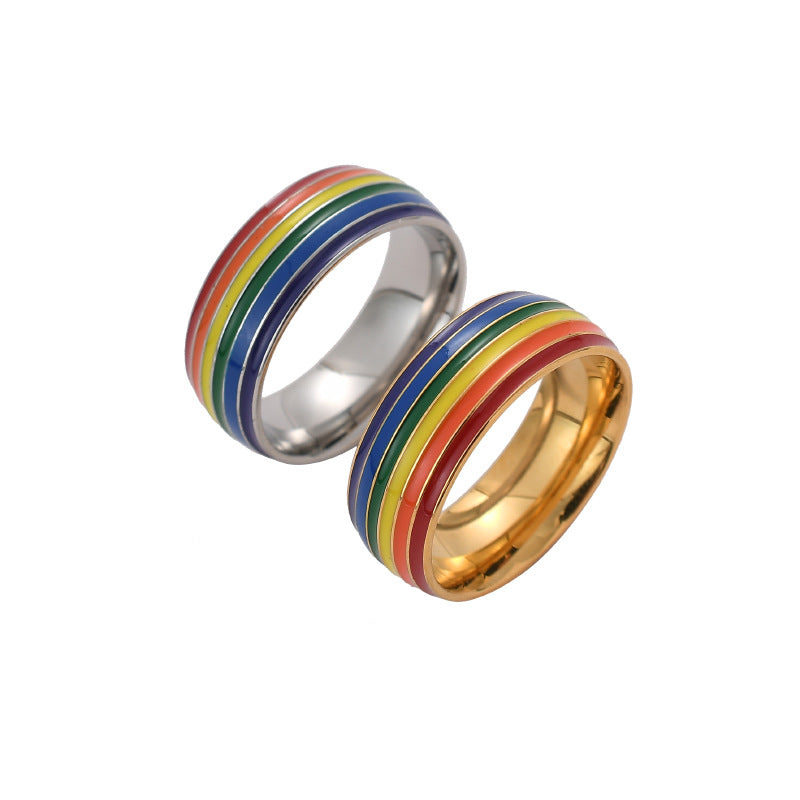 Two rings with rainbow stripes on a white background
