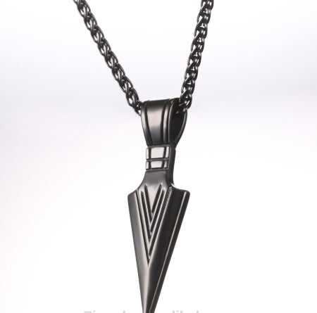 Metallic pendant necklace on a white background