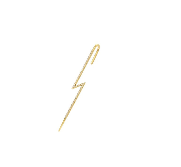 Gold lightning bolt-shaped earring on a white background