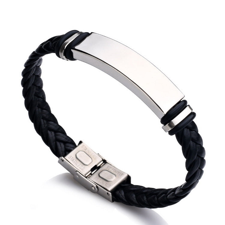 Black braided leather bracelet with a silver ID tag on a white background