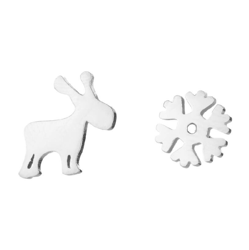 White reindeer and snowflake-shaped cookie cutters on a white background