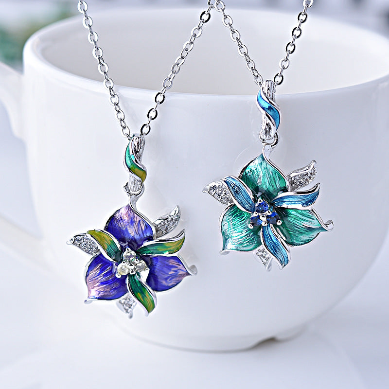 Floral pendant necklace on a white background