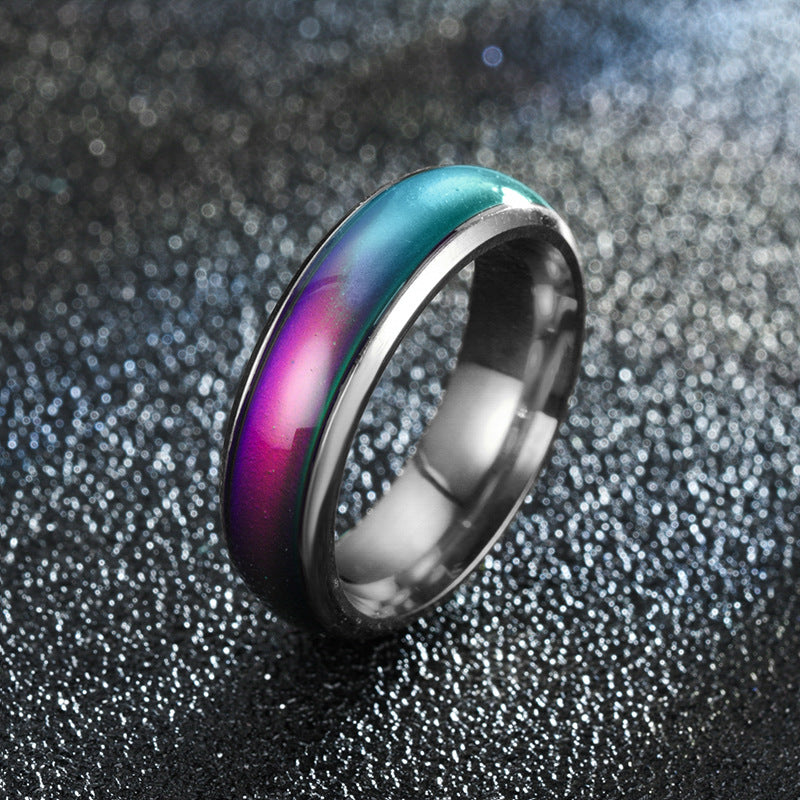 Multicolored ring with a gradient effect on a textured black background