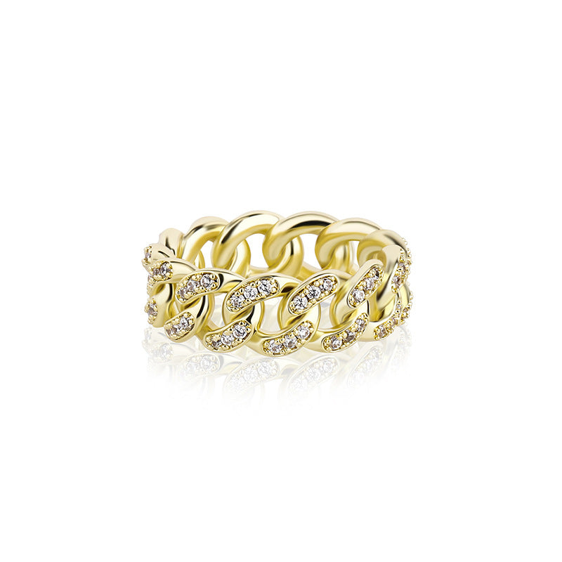 Gold chain-link ring with embedded diamonds on a white background