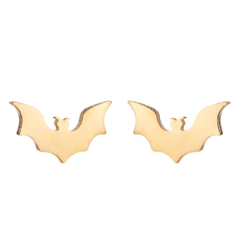 Gold bat-shaped earrings on a white background