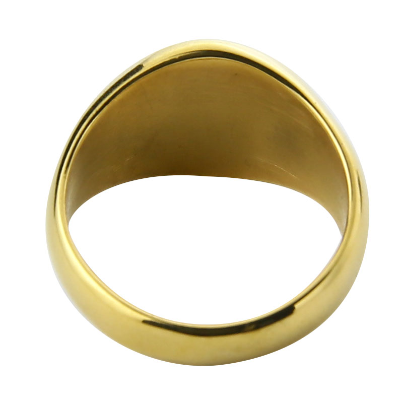 Gold ring on a white background