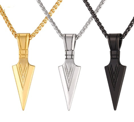 Three arrowhead-shaped pendants on different colored chains.