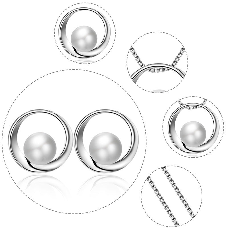 Pearl earrings with close-up details on a white background