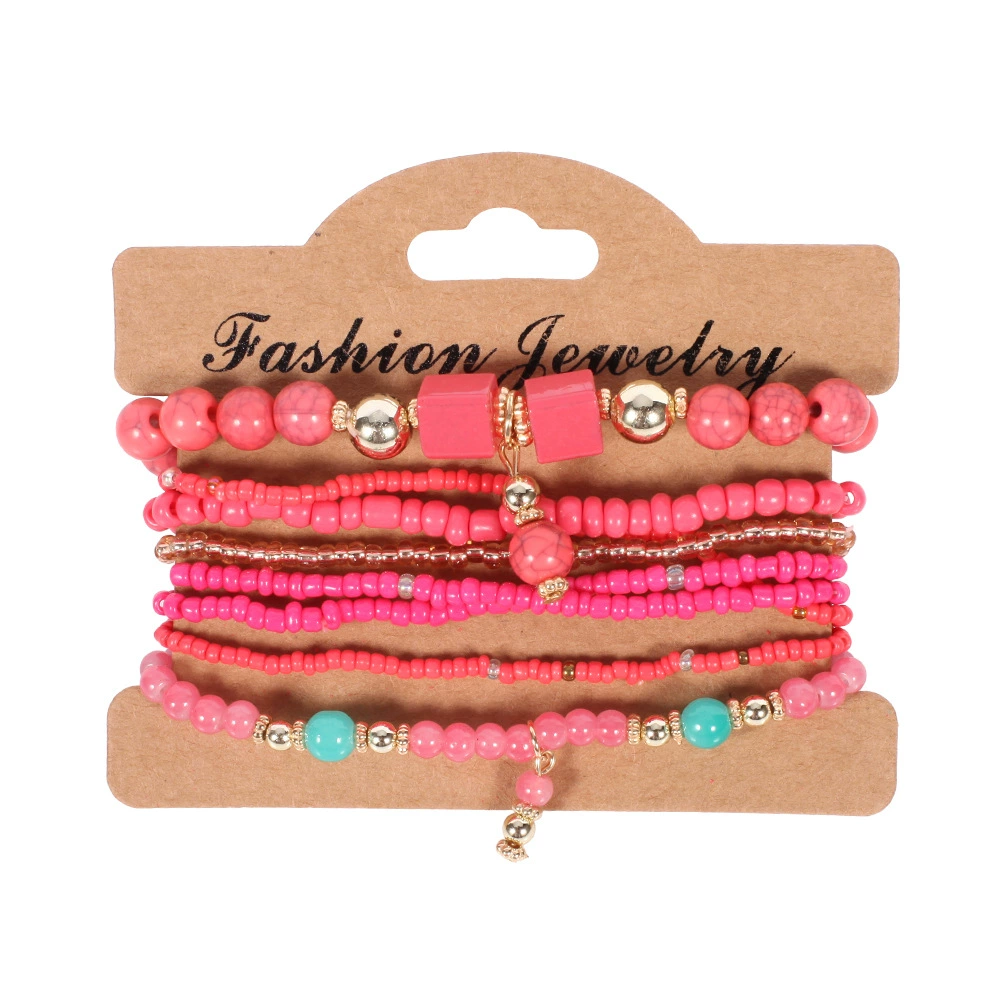 Set of pink beaded bracelets on a 'Fashion Jewelry' card