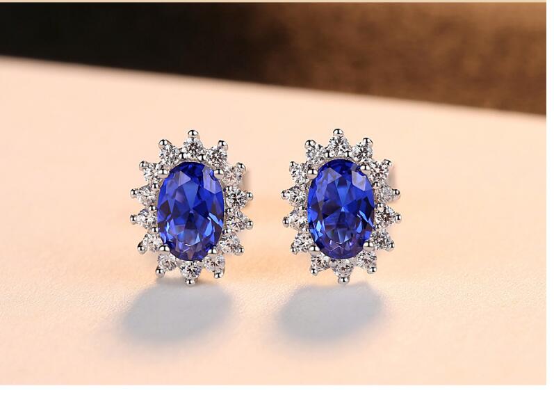 Natural Royal Blue Oval Topaz Stud Earrings