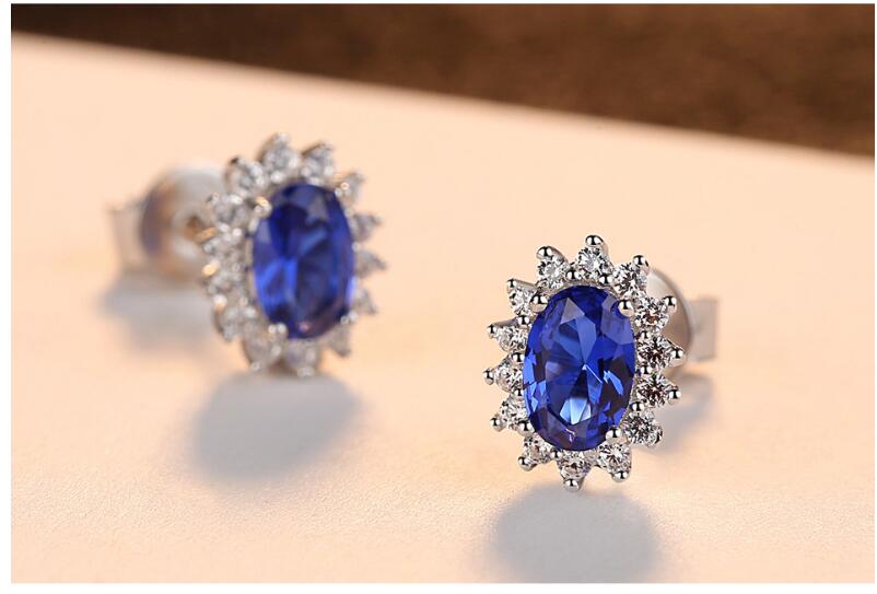Natural Royal Blue Oval Topaz Stud Earrings