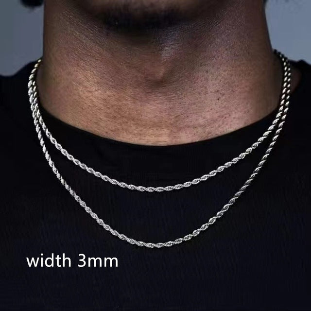 Silver chain necklace with a width of 3mm on a black background
