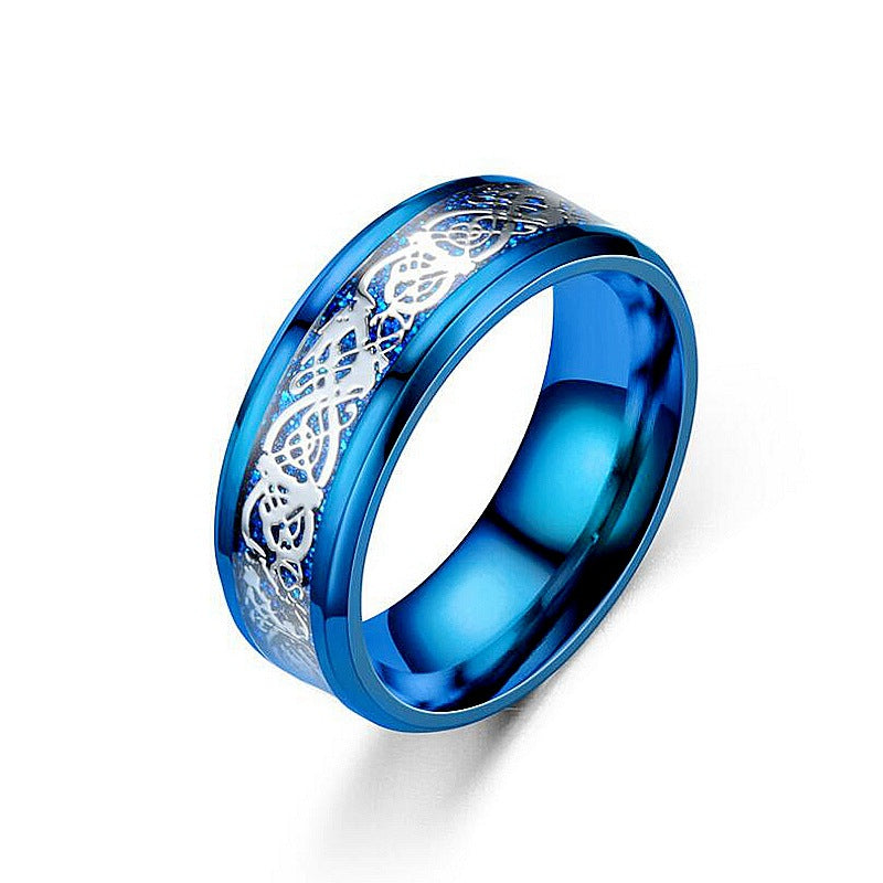 Blue ring with silver Celtic knot design on a white background