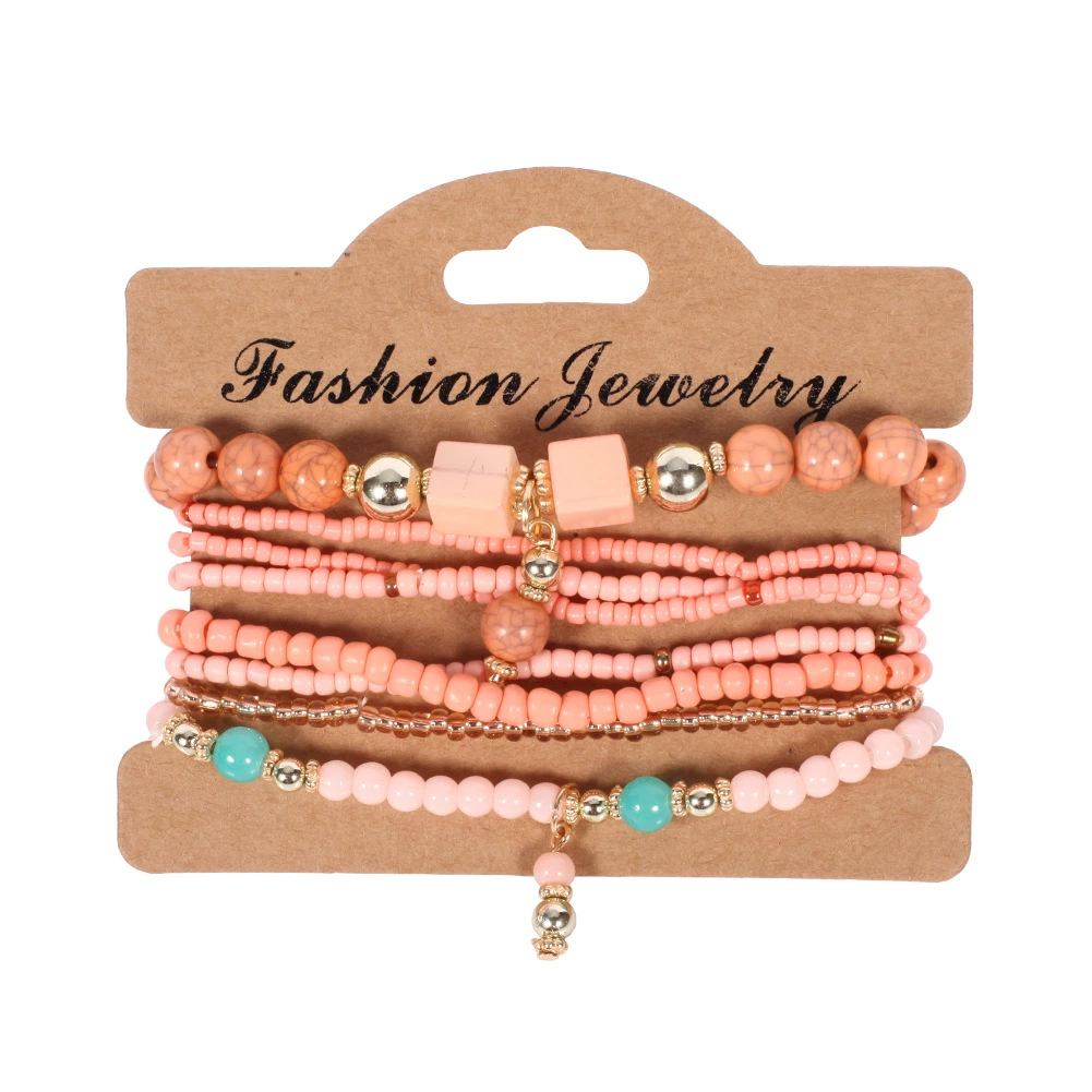 Set of pink beaded bracelets on a 'Fashion Jewelry' card