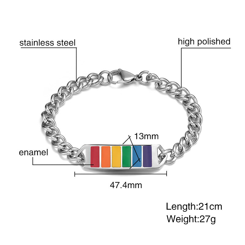 Silver bracelet with rainbow enamel bar, labeled for material and dimensions.