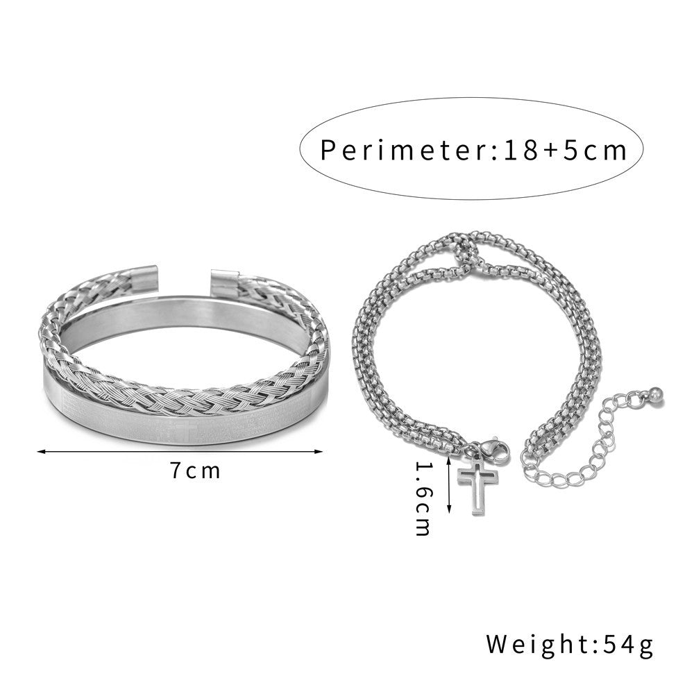 Silver bracelet with chain design and cross charm on a white background