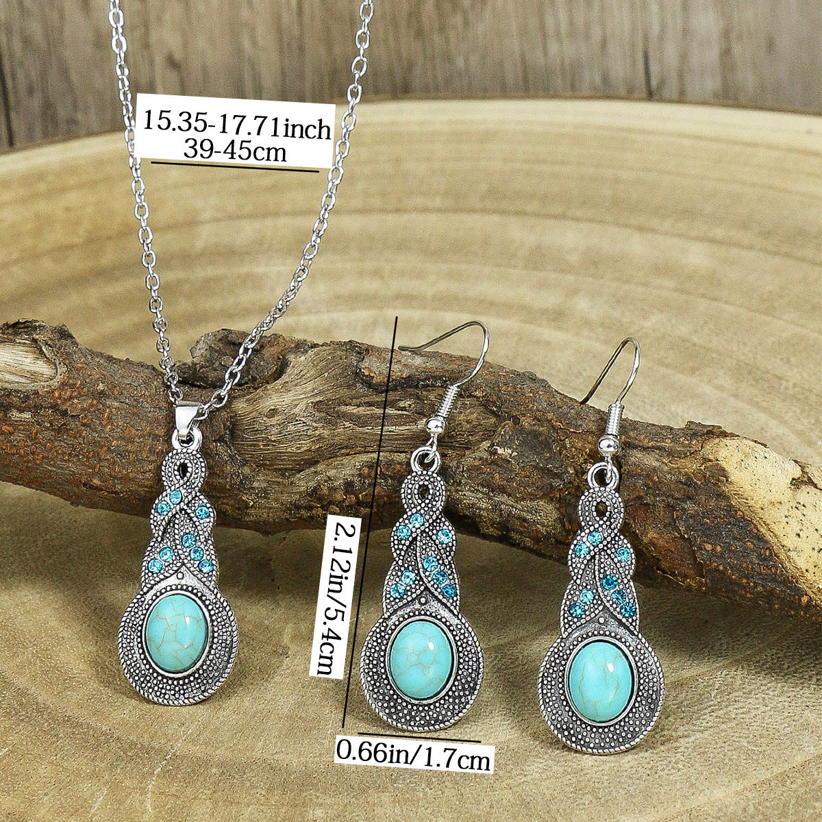 Jewelry set with turquoise stones on a wooden surface