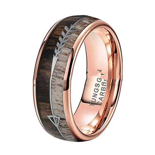 Rose gold ring with wooden inlay on a white background