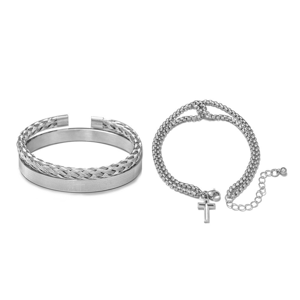 Silver ring and bracelet set on a white background