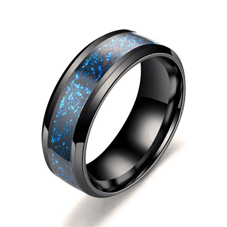 Black ring with blue and silver speckled interior on a white background