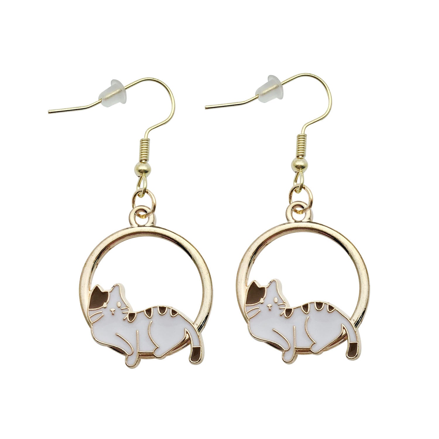 Cat-shaped earrings with gold circular frames on a white background