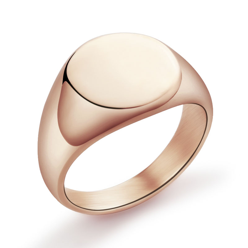 Rose gold ring with a flat top on a white background
