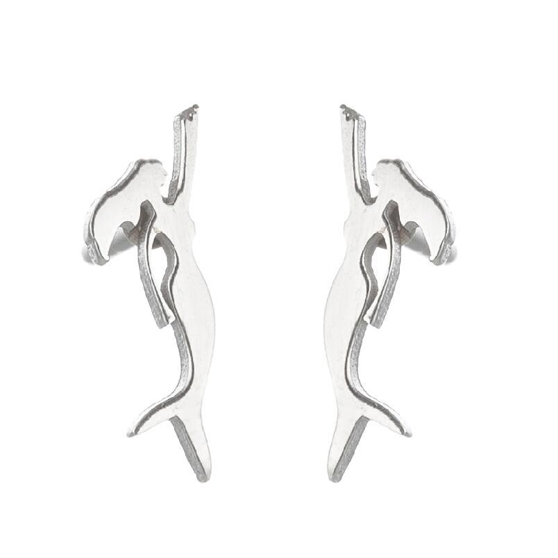 Pair of silver abstract earrings on a white background