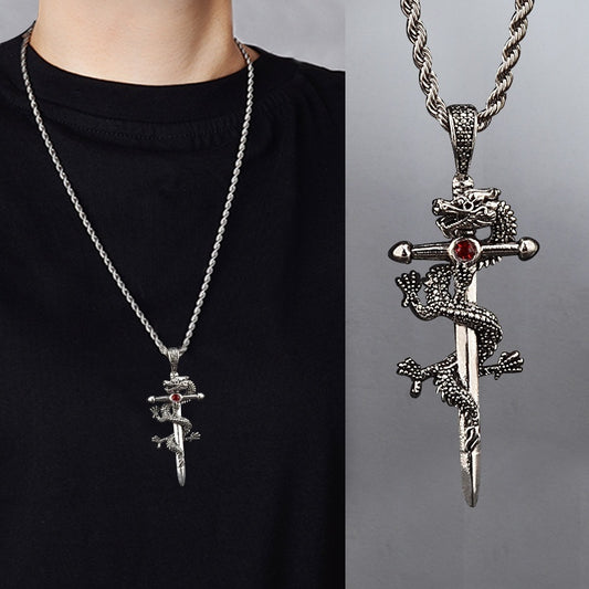 Silver dragon and sword pendant necklace on a black shirt with a gray background