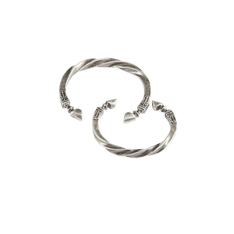 Silver hoop earrings on a white background