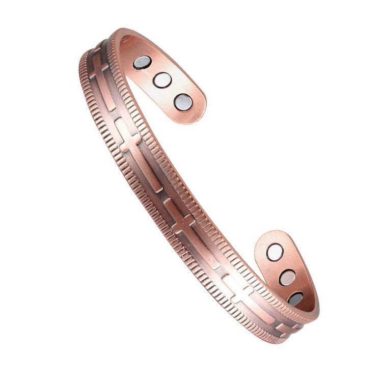 Rose gold bracelet with magnetic elements on a white background