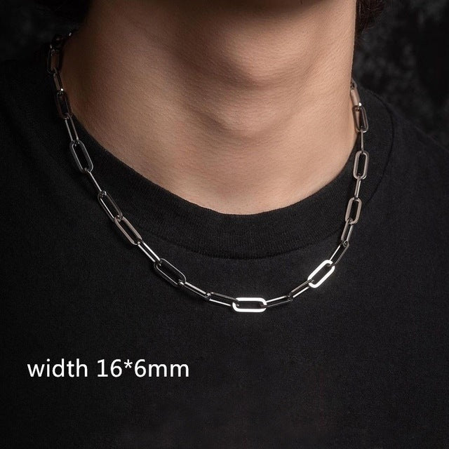 Silver chain necklace on a person wearing a black shirt with text indicating width 16*6mm.