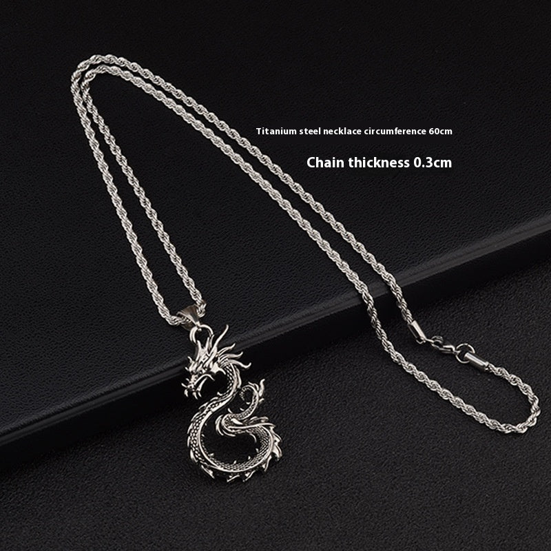 Silver dragon necklace on a black background with text about chain thickness and length.