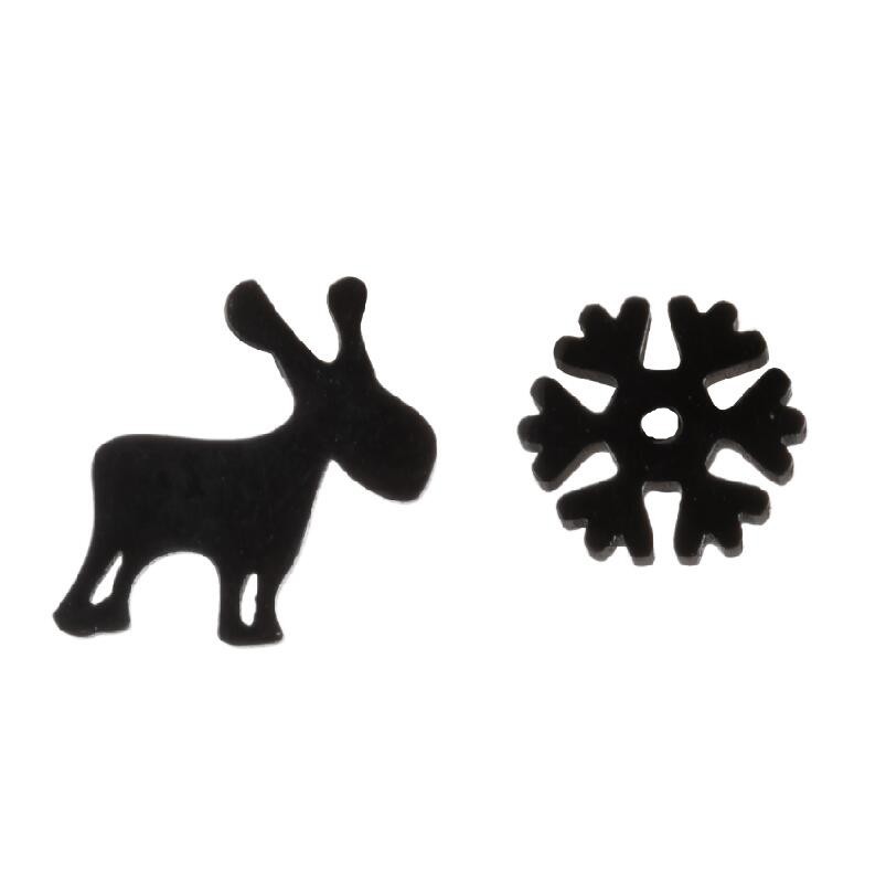 Black reindeer and snowflake-shaped objects on a white background