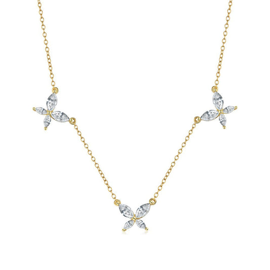Gold necklace with butterfly-shaped diamond pendants on a white background