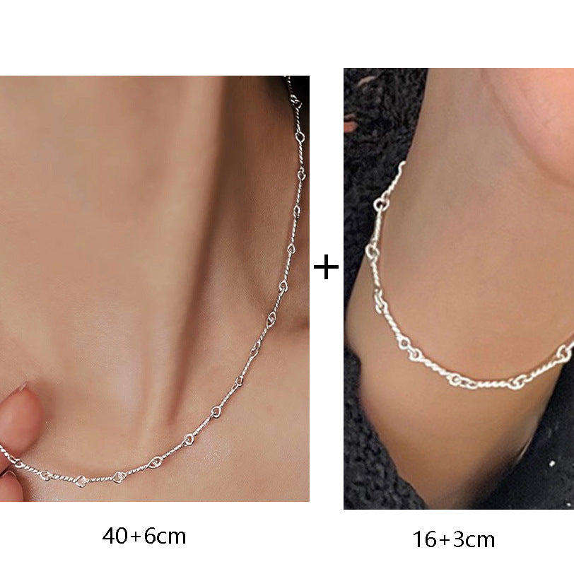 Silver anklets on feet with measurements displayed