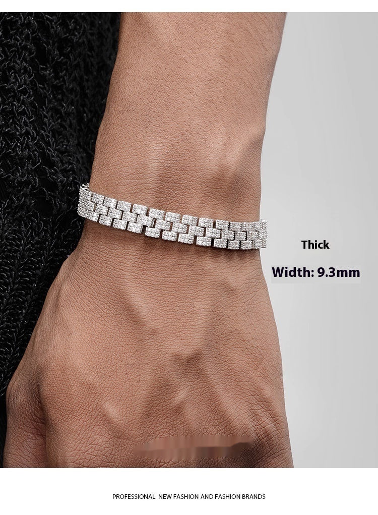 Silver bracelet with clear stones on a wrist, labeled 'Thick Width: 9.3mm'.