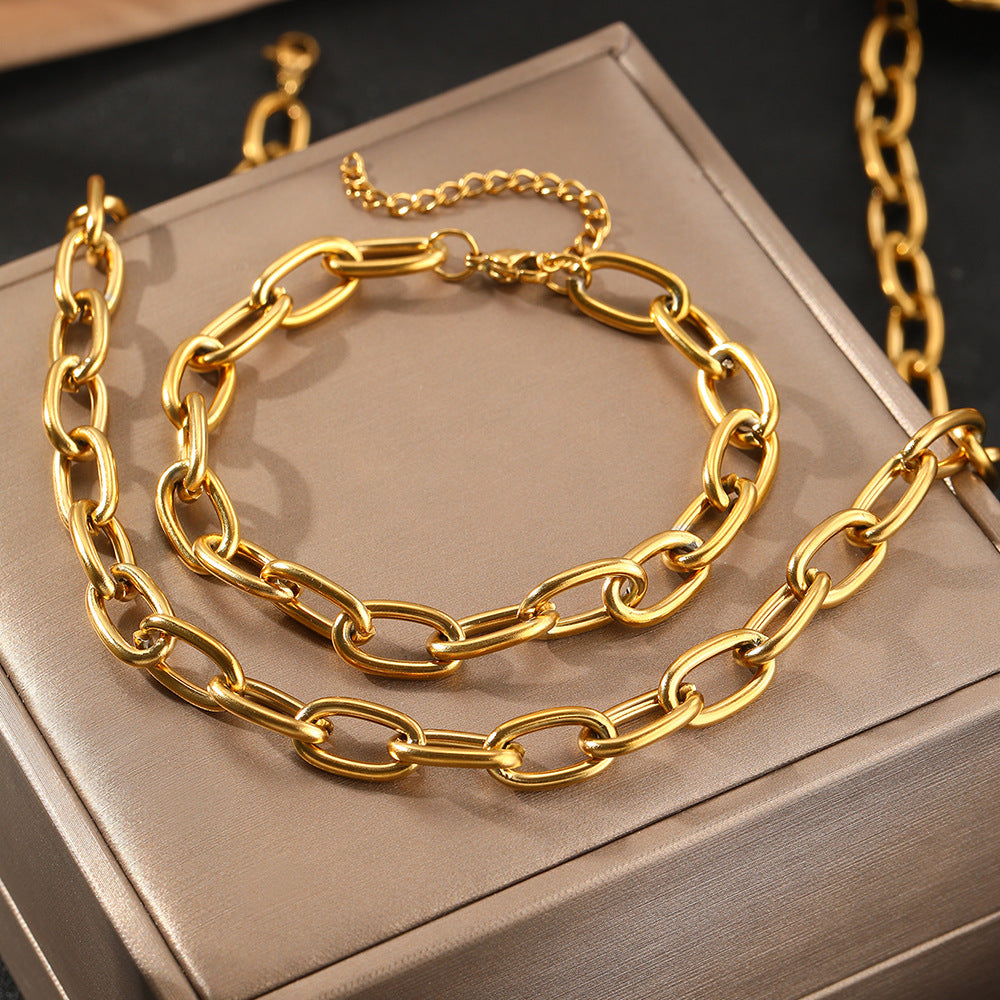 Gold chain necklace on a jewelry box
