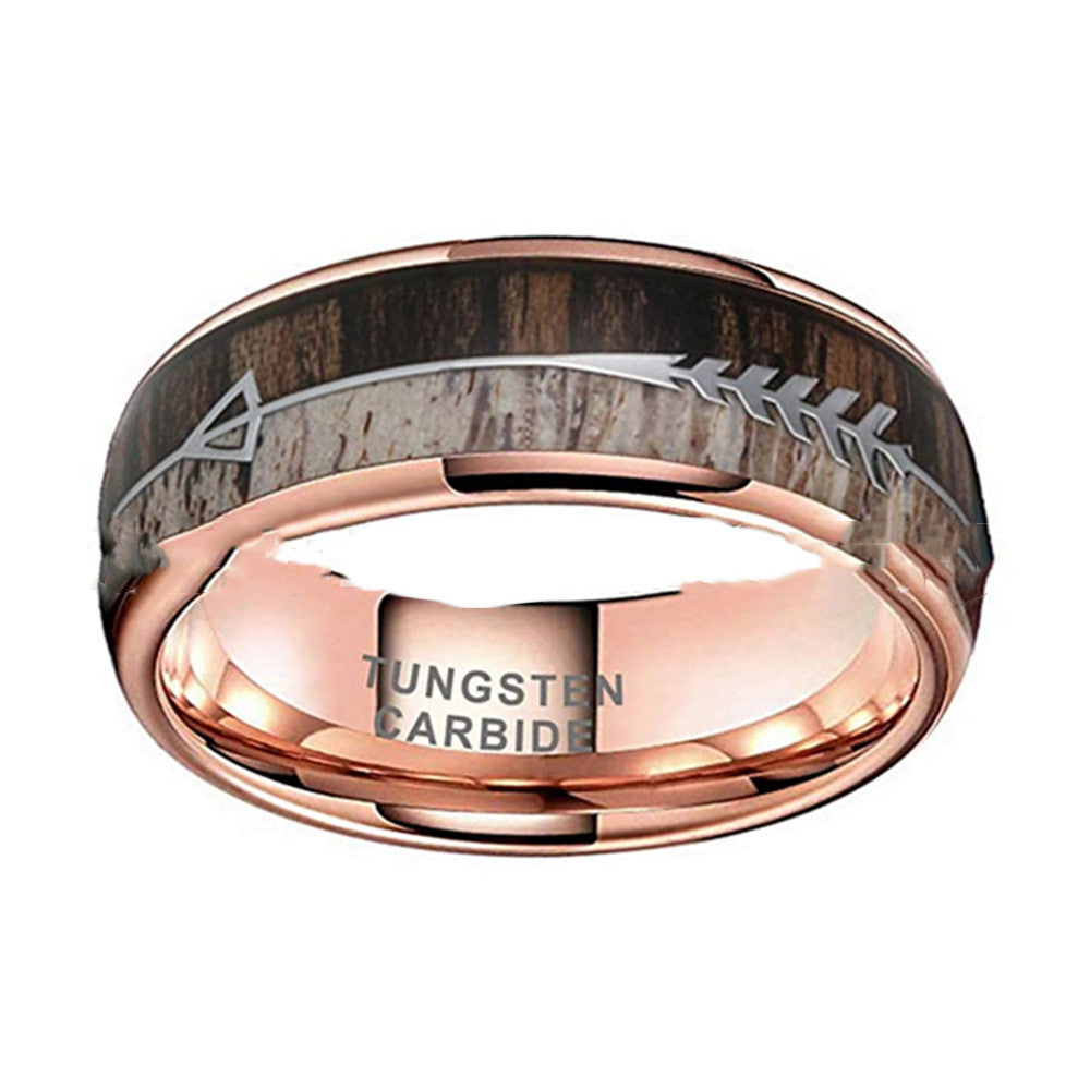 Rose gold tungsten carbide ring with wooden inlay on a white background