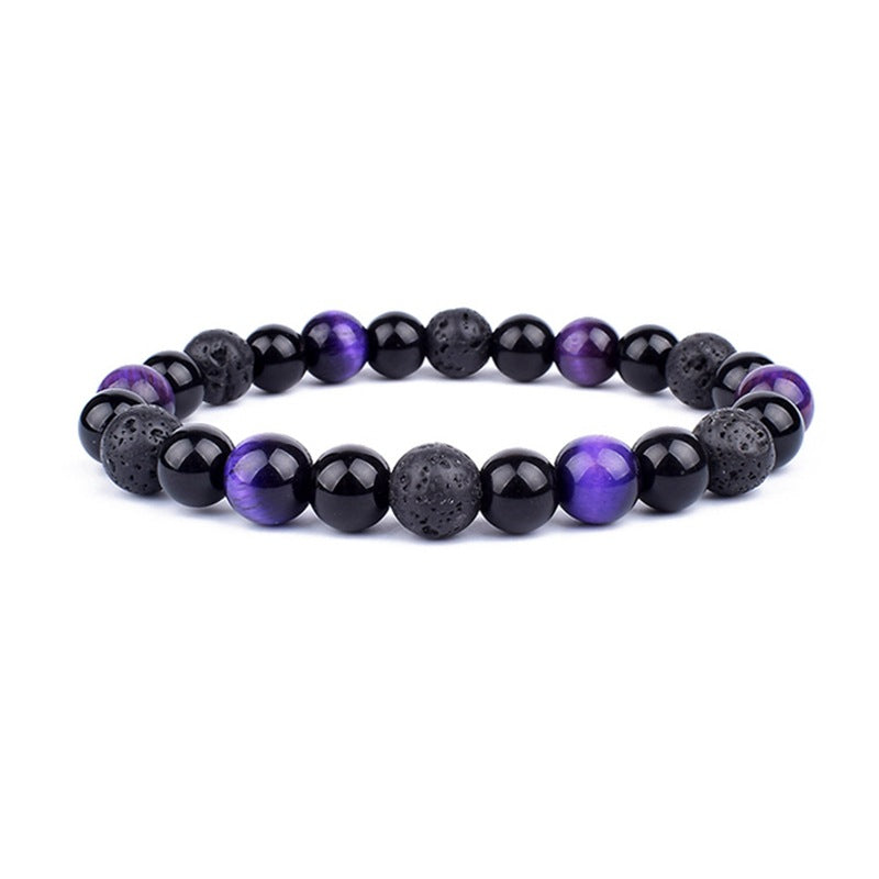 Beaded bracelet with purple and black beads on a white background