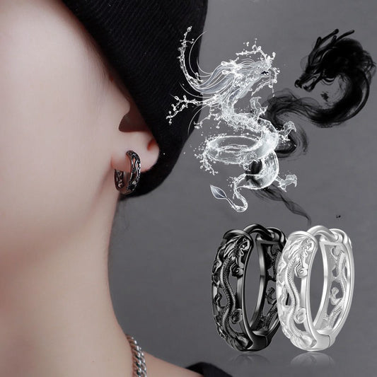 Earring with dragon design on a gray background