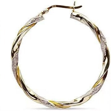 Gold hoop earrings with a textured design on a white background